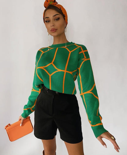 Blusa de malla de color geométrico