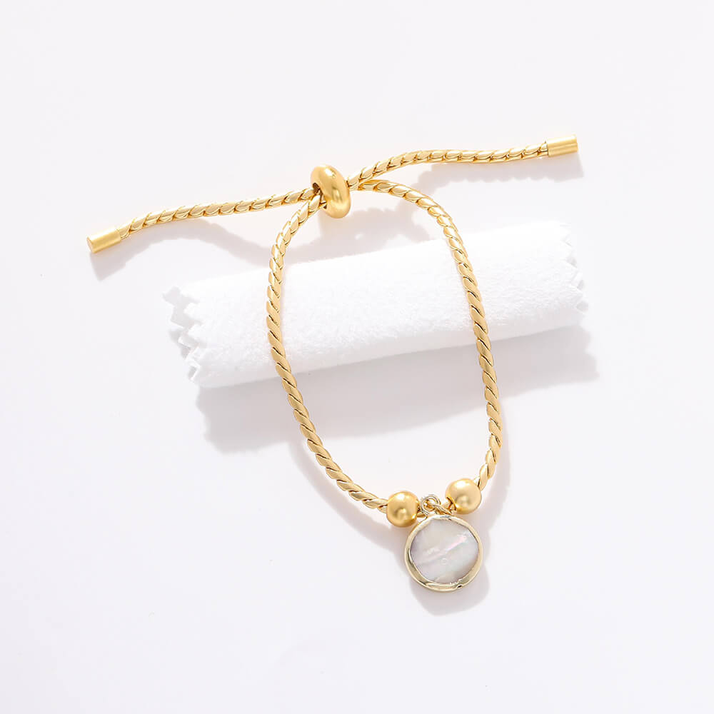 Pulsera Piedra Blanca Cordón Acero Dorado