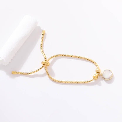 Pulsera Piedra Blanca Cordón Acero Dorado